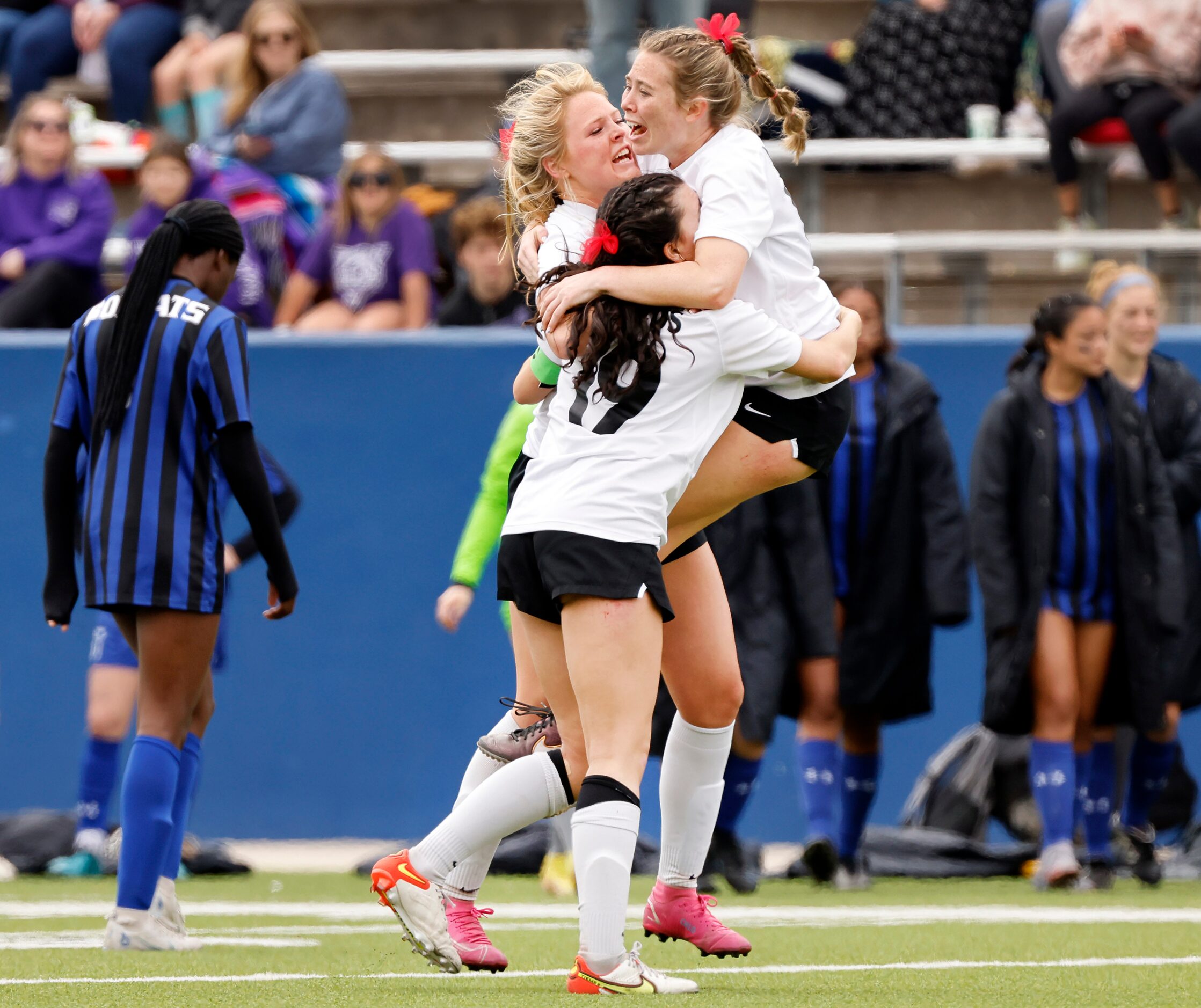 Flower Mound Marcus Chloe Adams (left) Carys Torgesen (19) and Allie Williams (right)...