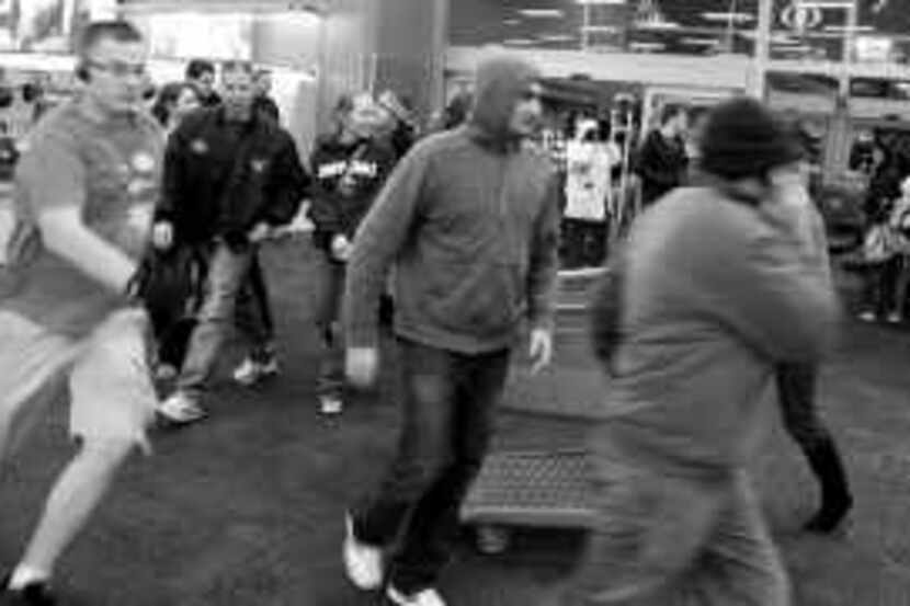 Shoppers at Super Target in Allen ran into the store at 3 a.m. to take advantage of Black...