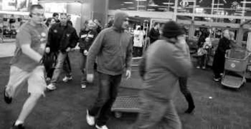 Shoppers at Super Target in Allen ran into the store at 3 a.m. to take advantage of Black...
