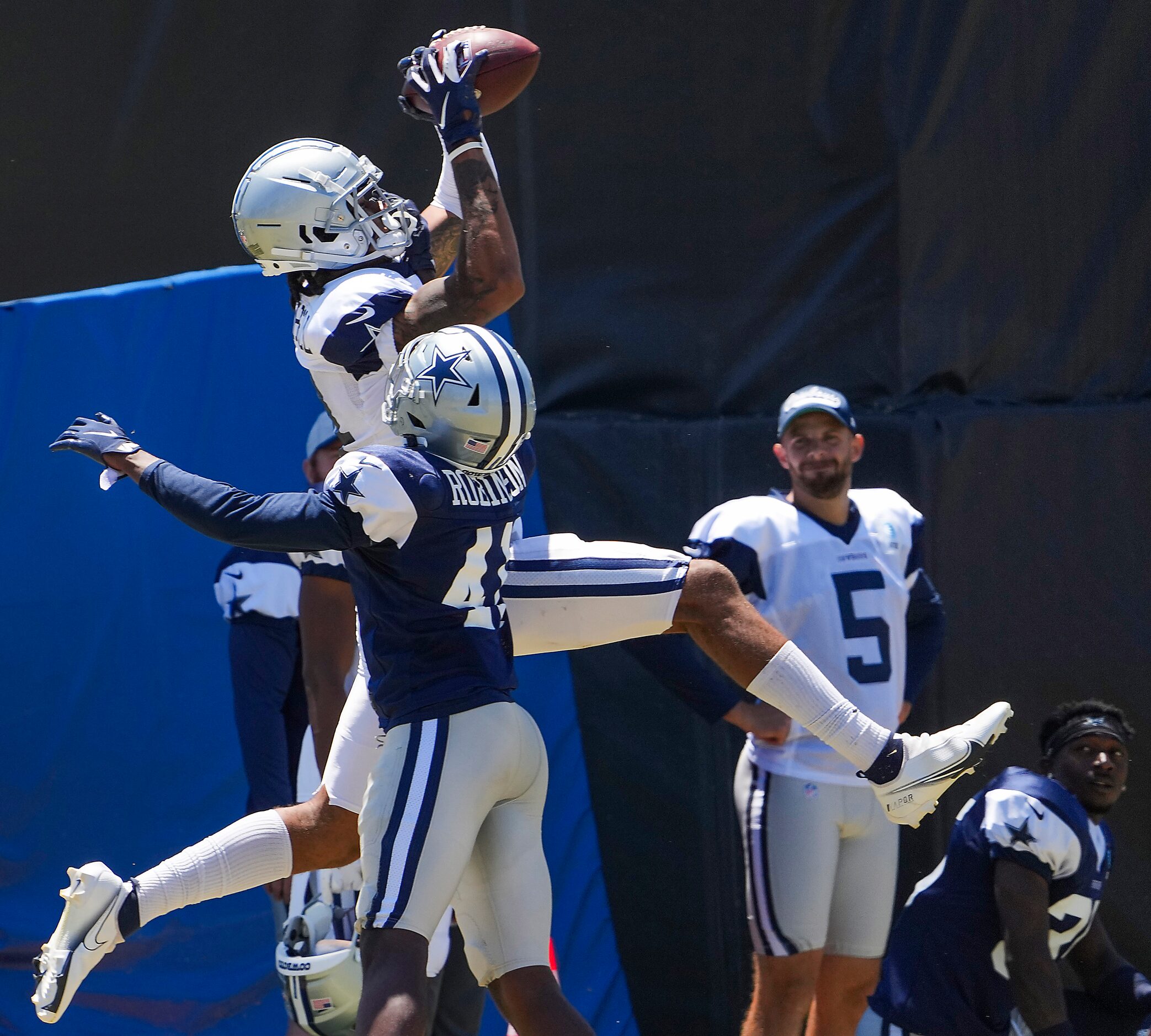 Dallas Cowboys wide receiver Osirus Mitchell (14) catches a pass over cornerback Reggie...