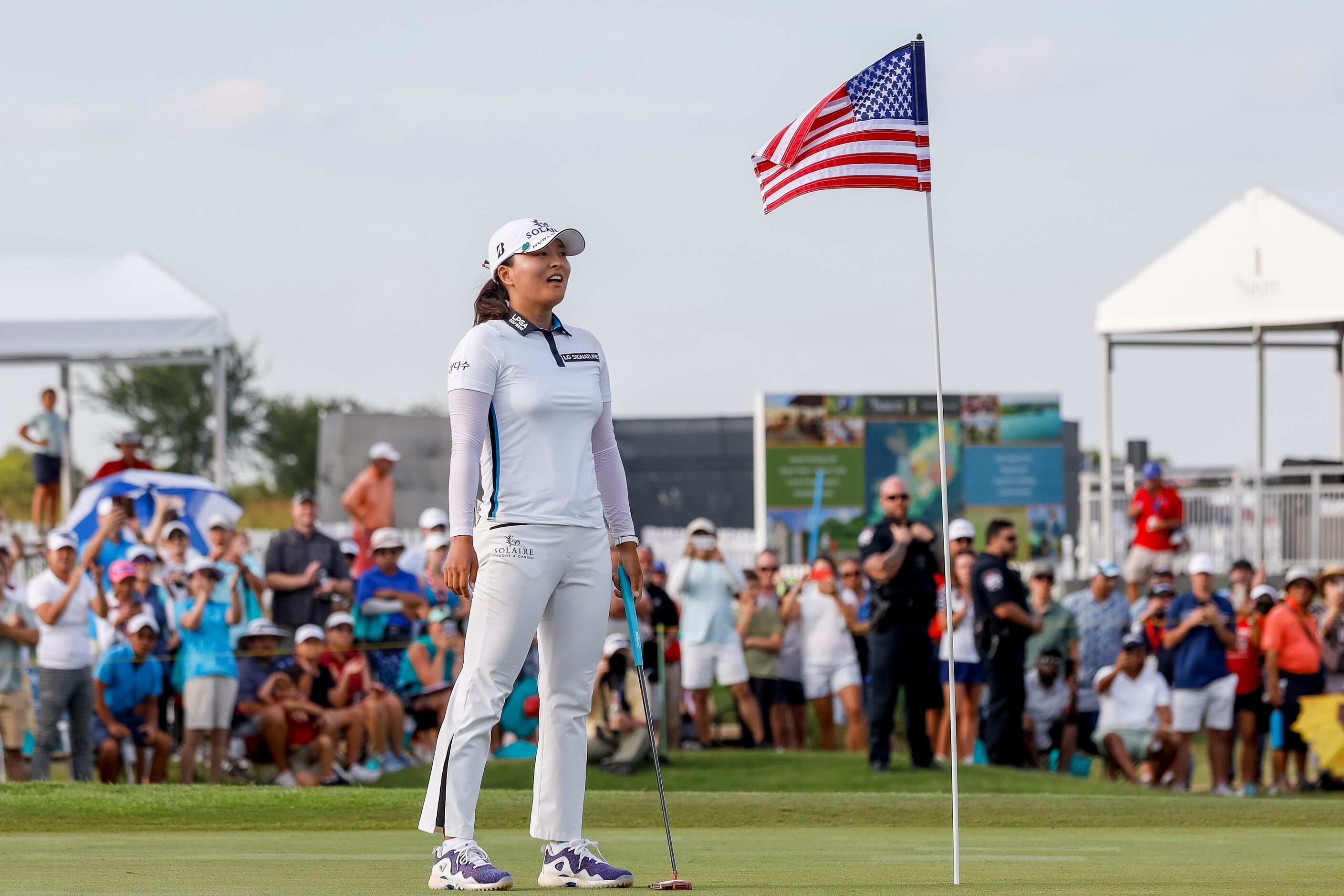 Professional golfer Jin Young Ko reacts after making the winning putt on the No. 18 green...