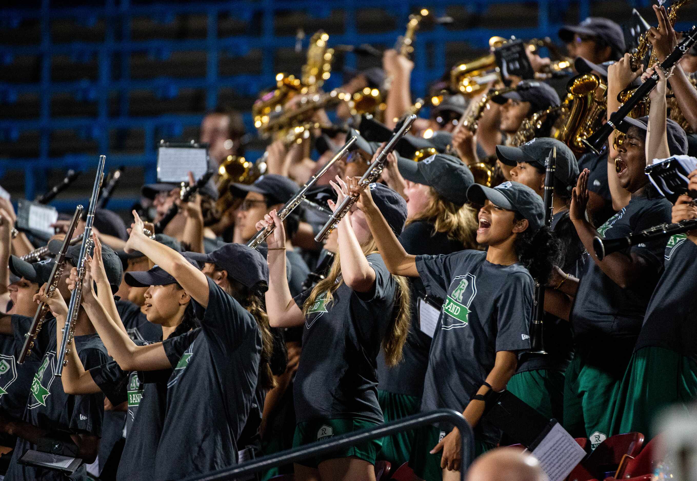 The Frisco Reedy band performs in the stands in the first half during a high school football...