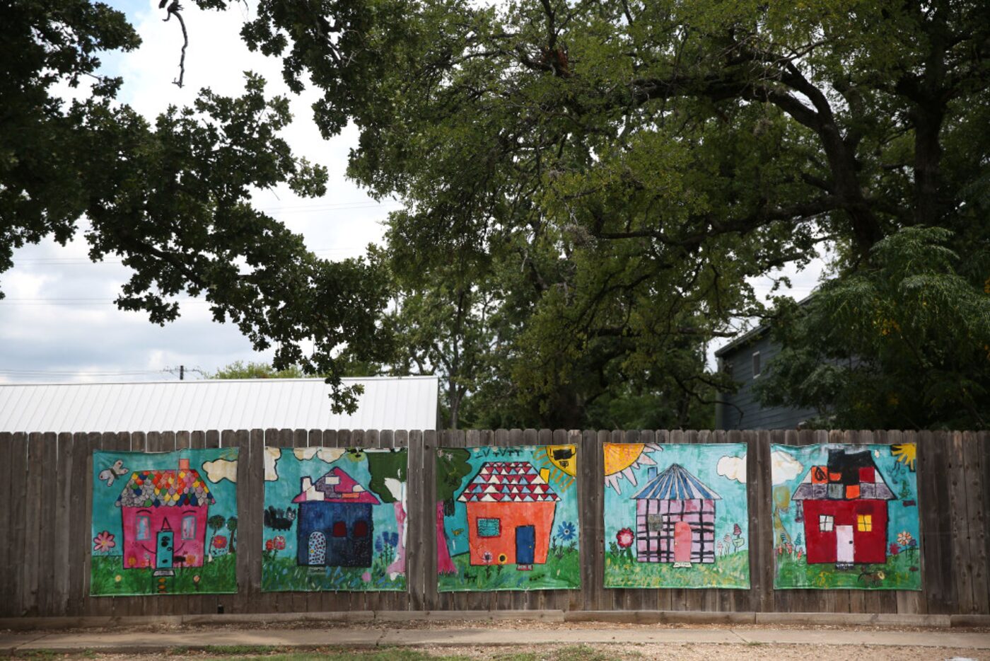 Homes painted by children at Helping Hand Home, a residential foster care facility for...