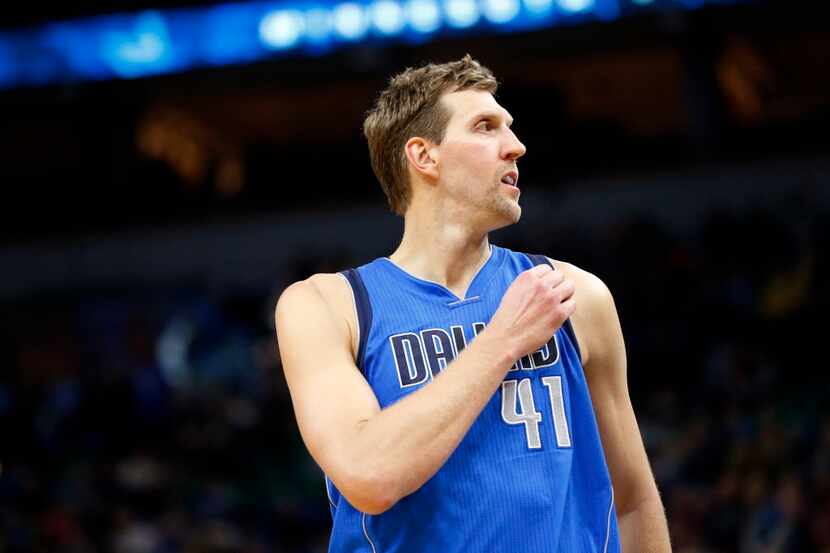 Dallas Mavericks' Dirk Nowitzki of Germany plays during the second half of an NBA basketball...