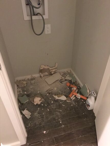 Remnants of pipe ripped out of a wall in one apartment shut down for sprinkler system repairs.