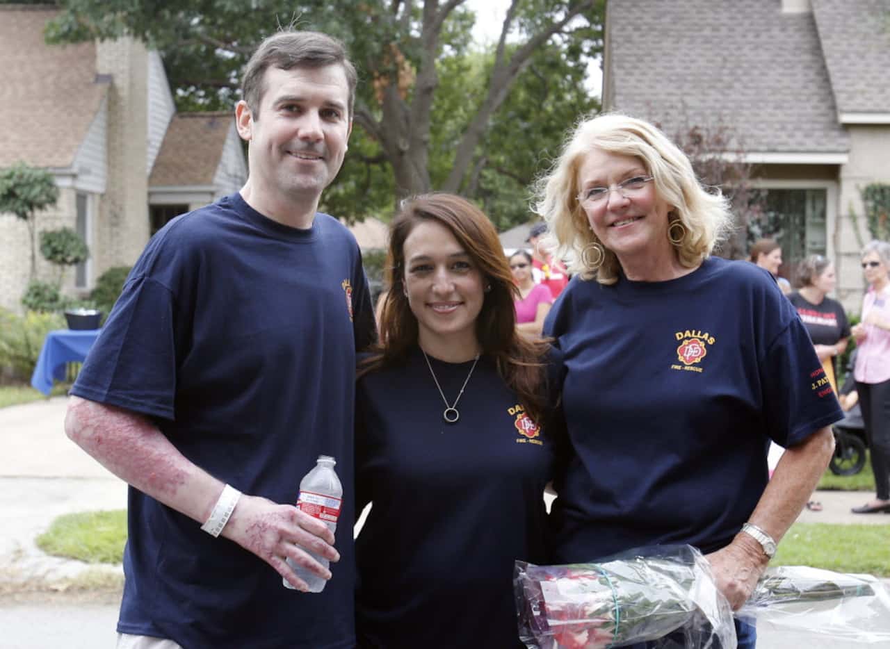 Dallas firefighter Jeff Patterson, wife Tina Hernandez, and mother Carolyn Beall during a...