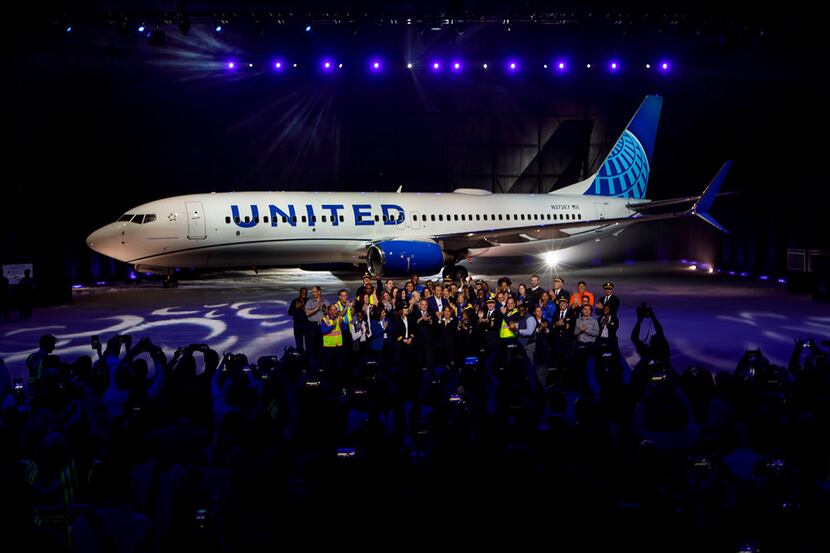 United Airlines unveils a new design for its planes on April 24, 2019, at O'Hare...