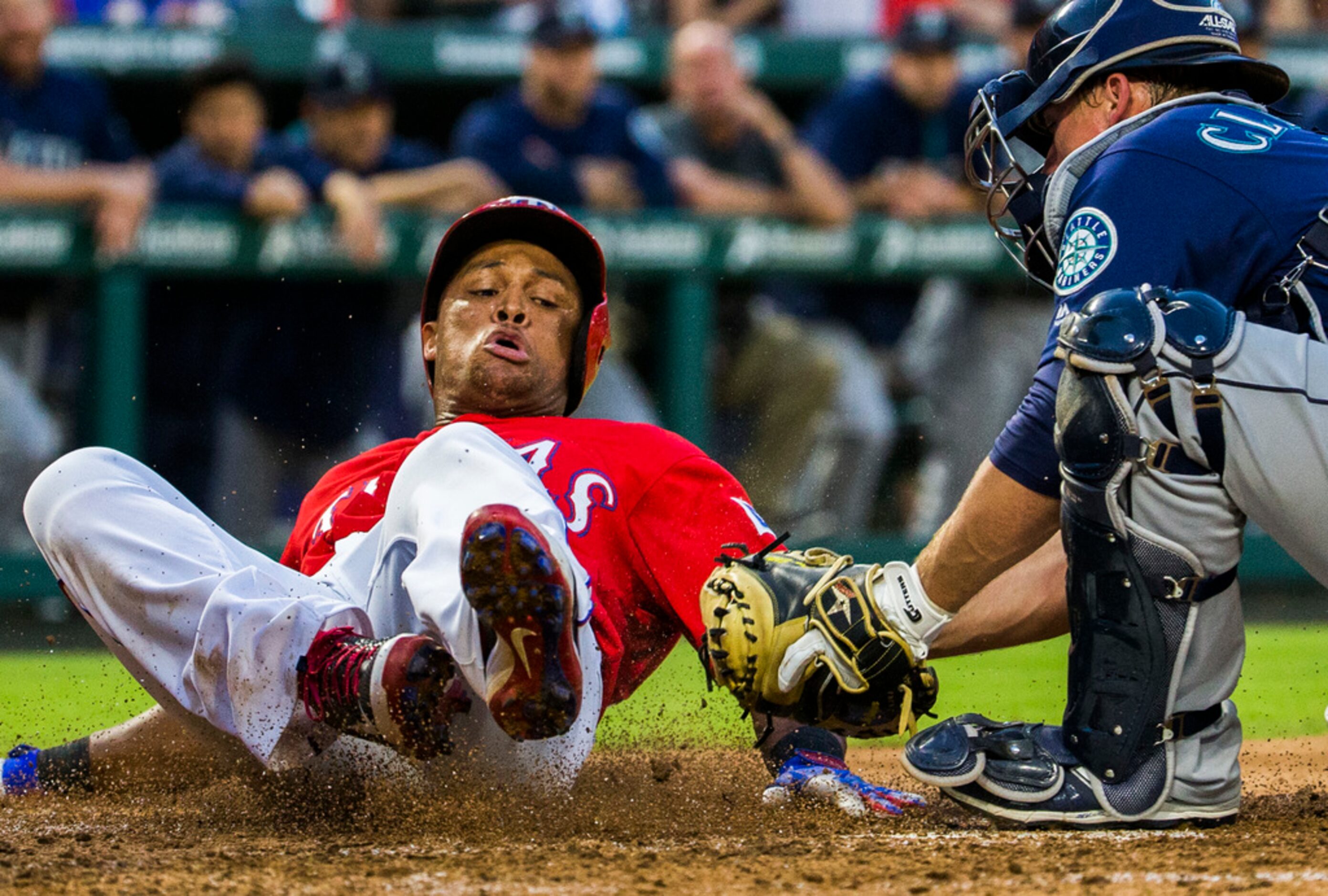 Texas Rangers third baseman Adrian Beltre (29) is tagged out at home by Seattle Mariners...