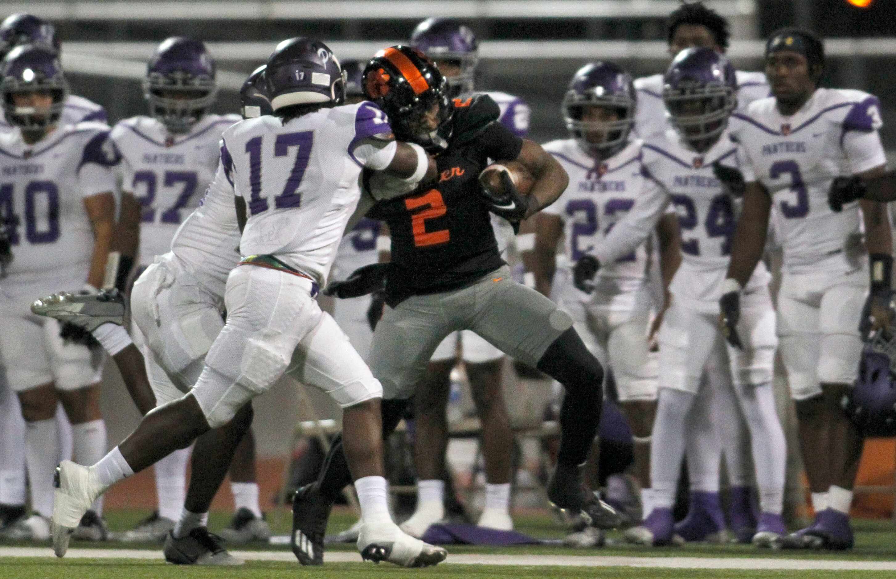 Lancaster running back Kewan Lacy (2) rushes for a first down as he is knocked out of bounds...