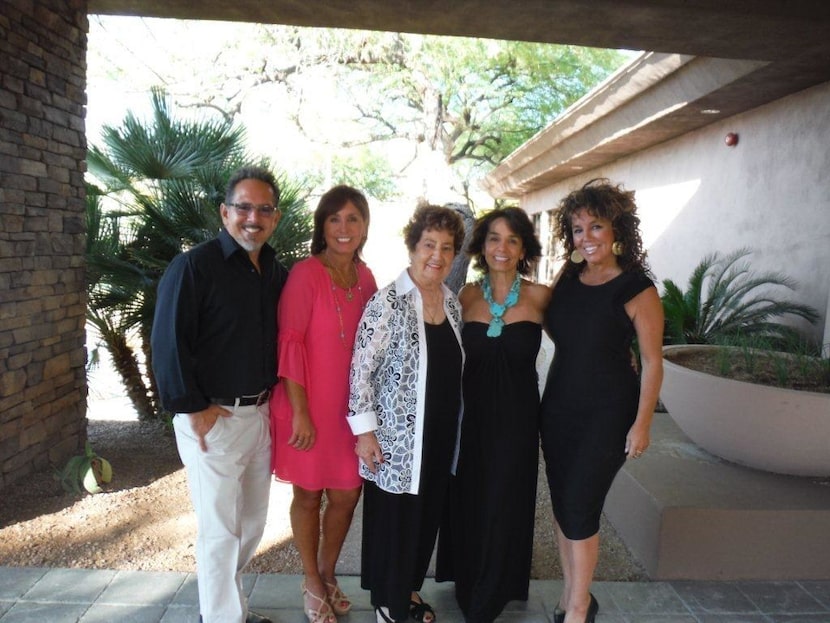 The children of Lisa Babu, center, took turns visiting her in Arizona, with the three...