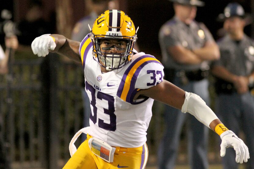 FILE - In this Sept 12, 2015, file photo, LSU safety Jamal Adams (33) reacts to a play...