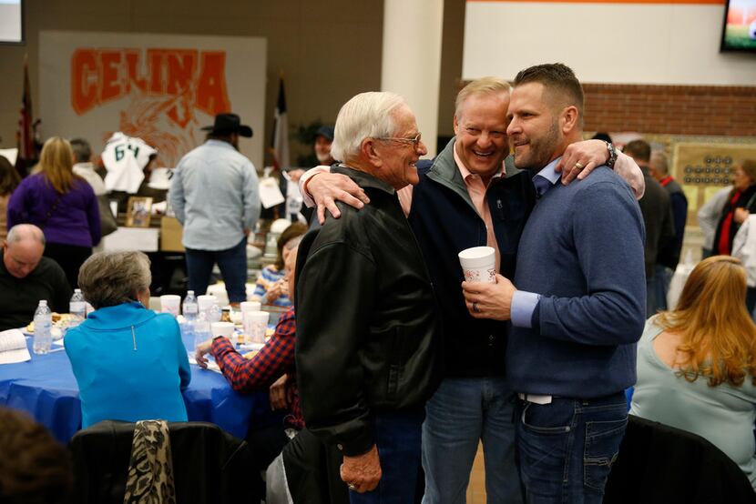 GA Moore (from left) is greeted by Steve Carey with Gary Don Moore before an auction for ...