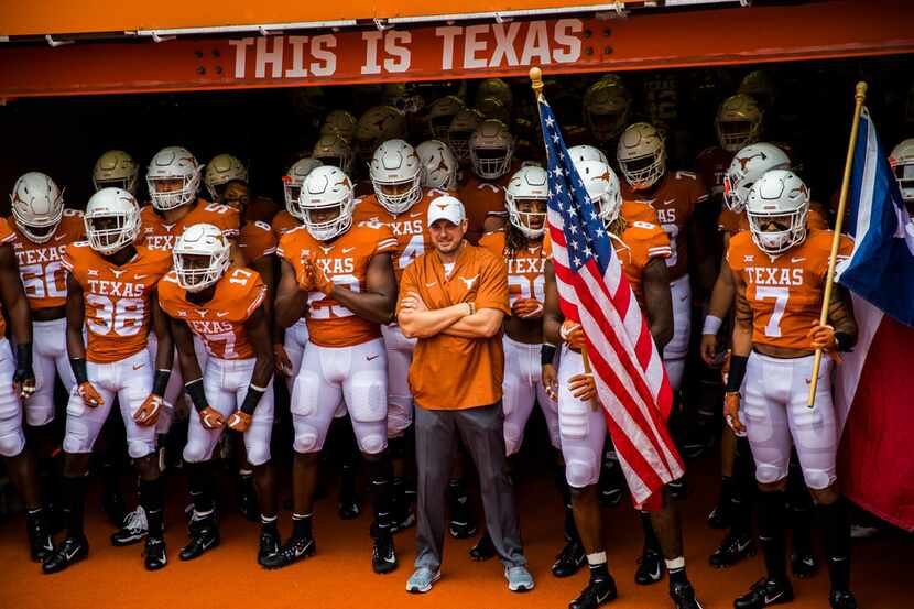 The Texas Longhorns players wait in the tunnel before a college football game between TCU...