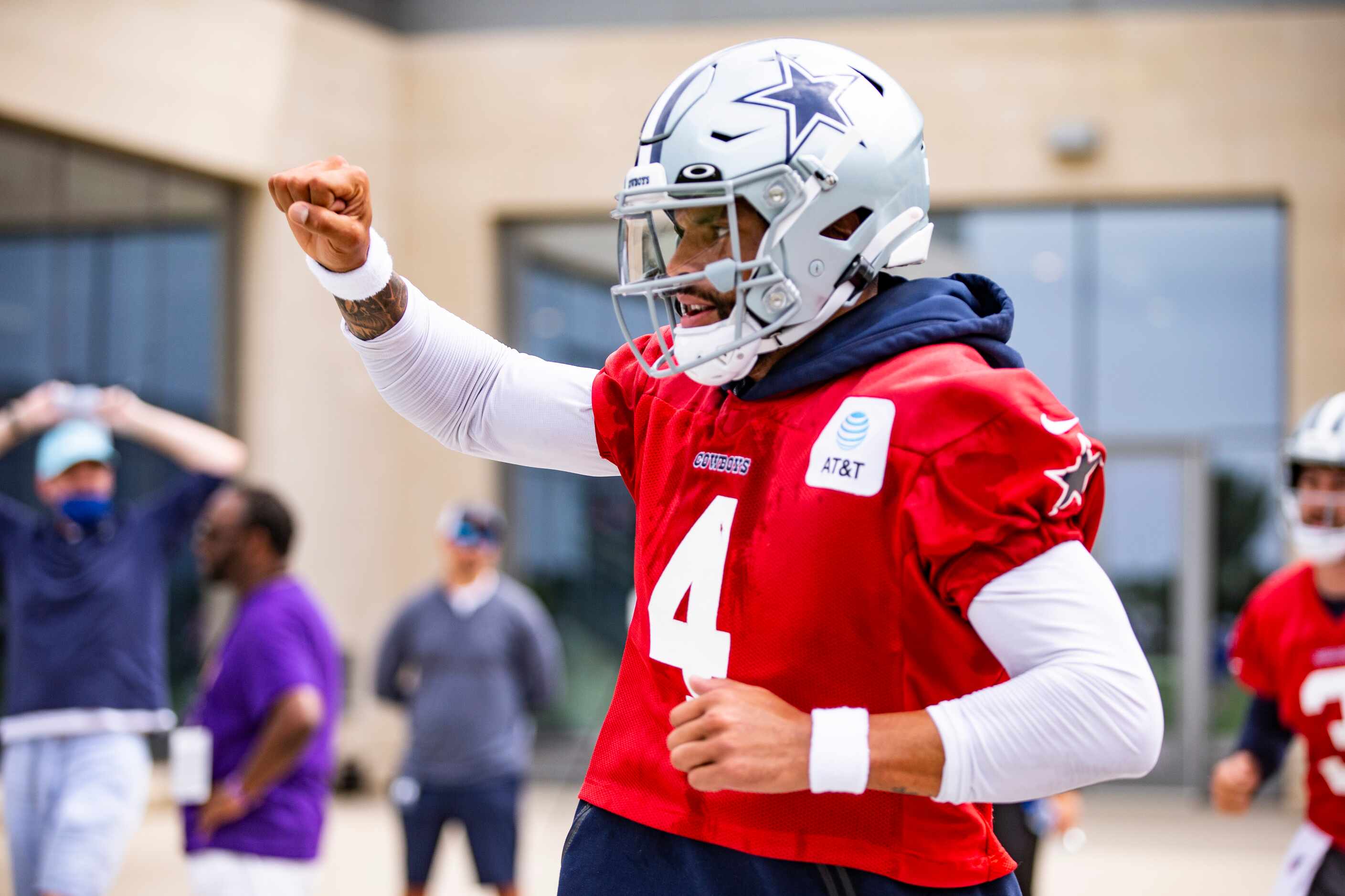 Dallas Cowboys quarterback Dak Prescott (4) runs onto the field during practice at The Star...