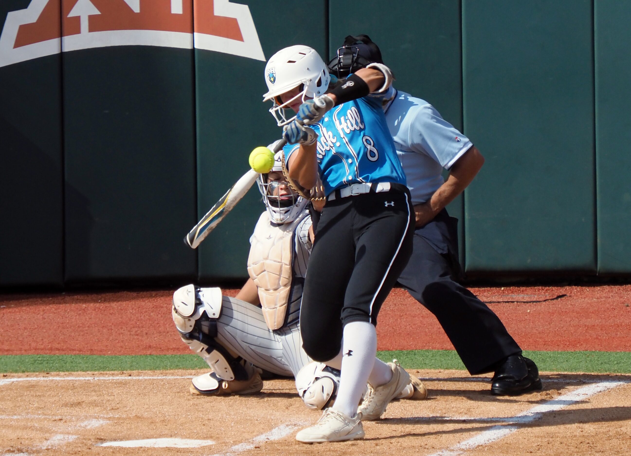 Prosper Rock Hill batter Ella Berlage hits the ball against Montgomery Lake Creek in the...