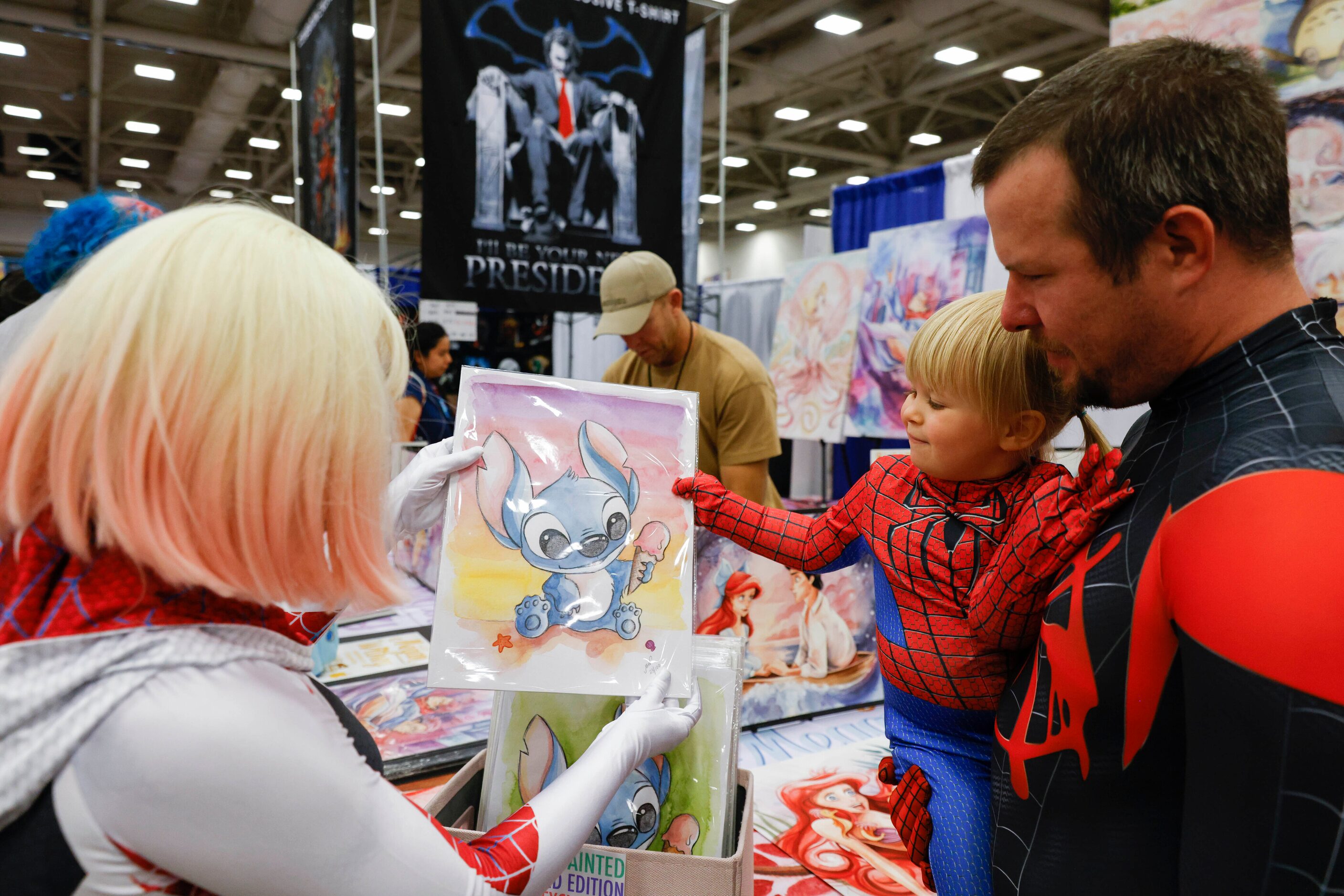 Katy Wilson (left) and her husband Tim of Fort Worth show  two and half year old daughter...