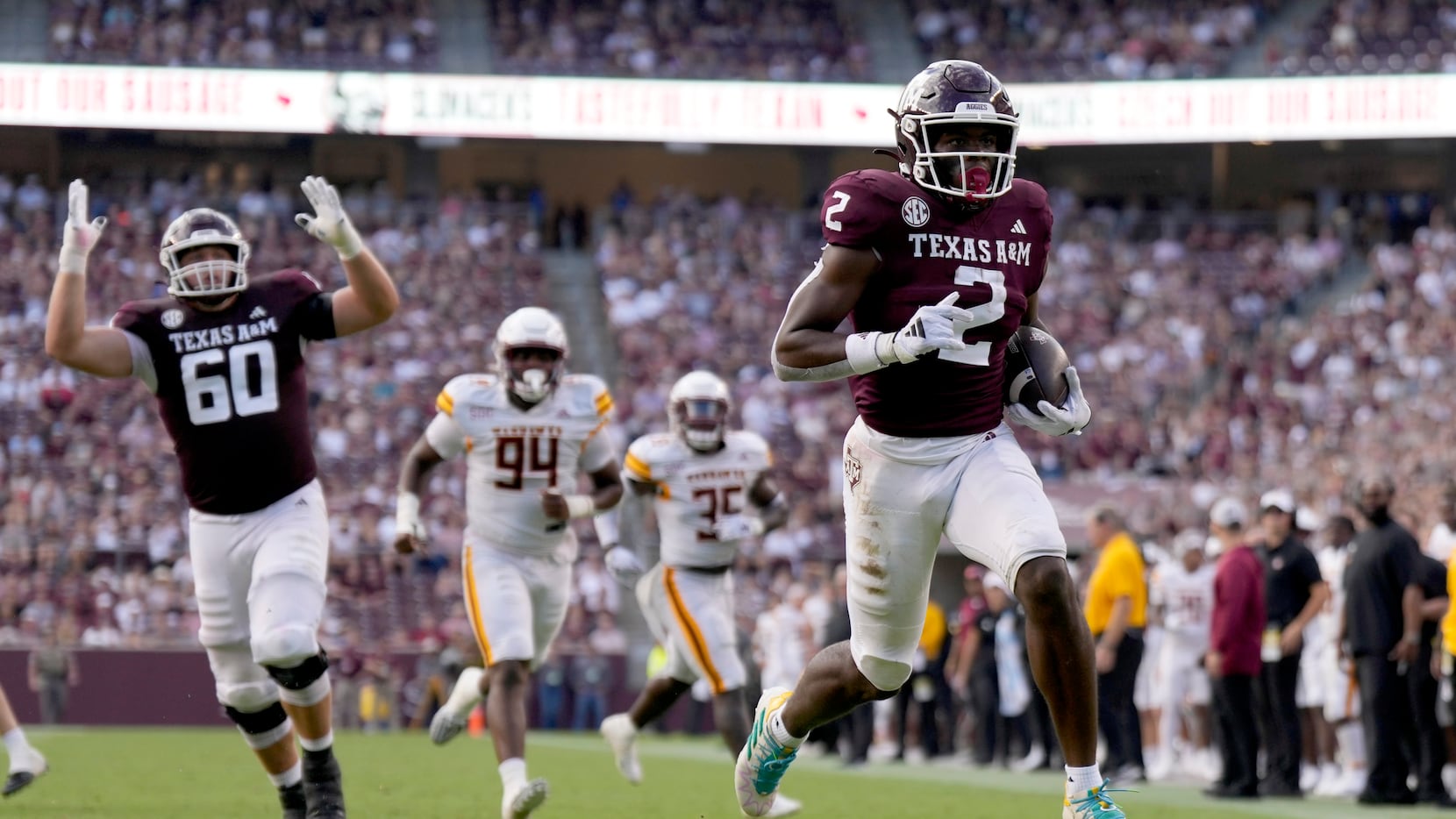 Texas A&M running back Rueben Owens (2) skips into the end-zone for a touchdown against...