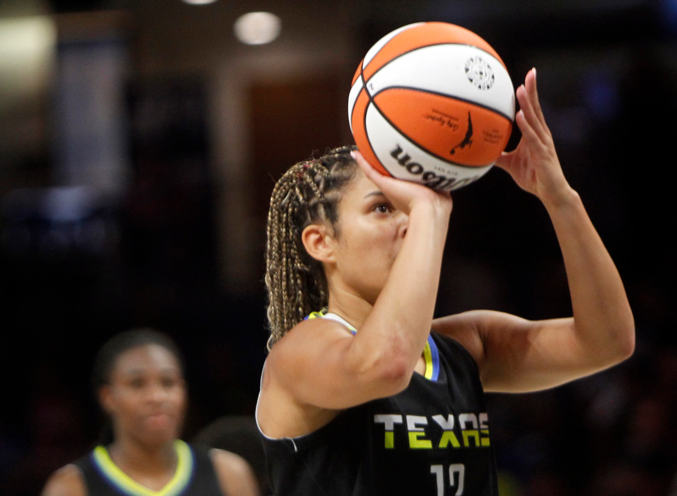 Dallas Wings guard Veronica Burton (12) sinks a free throw during first half action against...