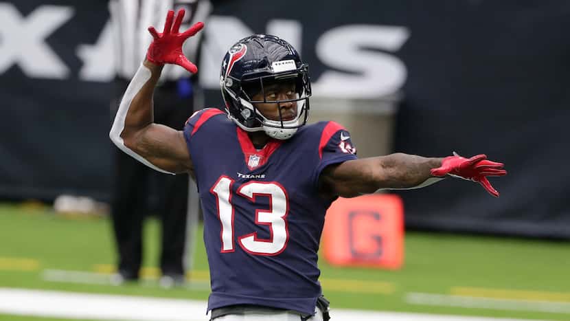 Houston Texans wide receiver Brandin Cooks (13) celebrates after scoring a touchdown against...