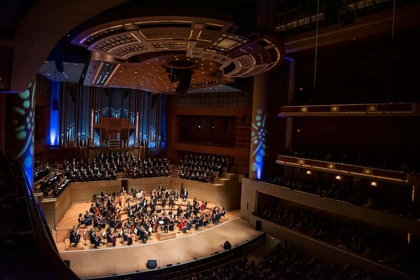 Members of the symphony concluded a song during a performance at the Morton H. Meyerson...