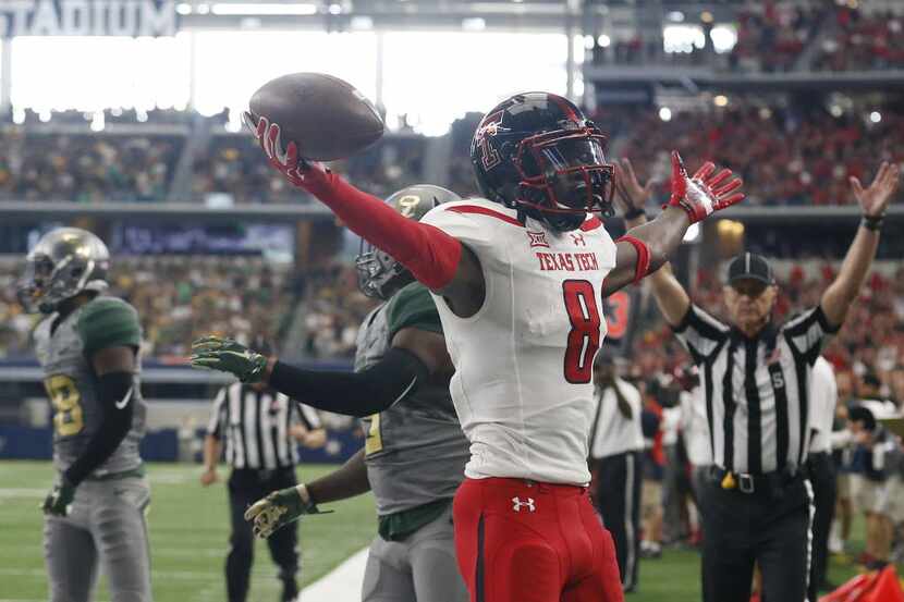 Texas Tech Red Raiders wide receiver Tony Brown (8) celebrates after catching a pass for a...