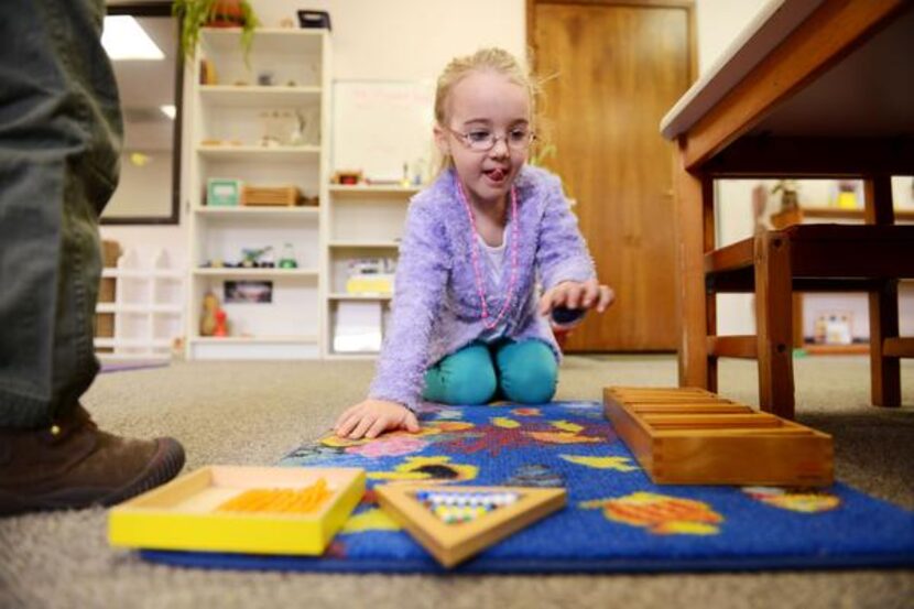 
Margaret Davis works independently on an activity. As each student finishes an assignment,...