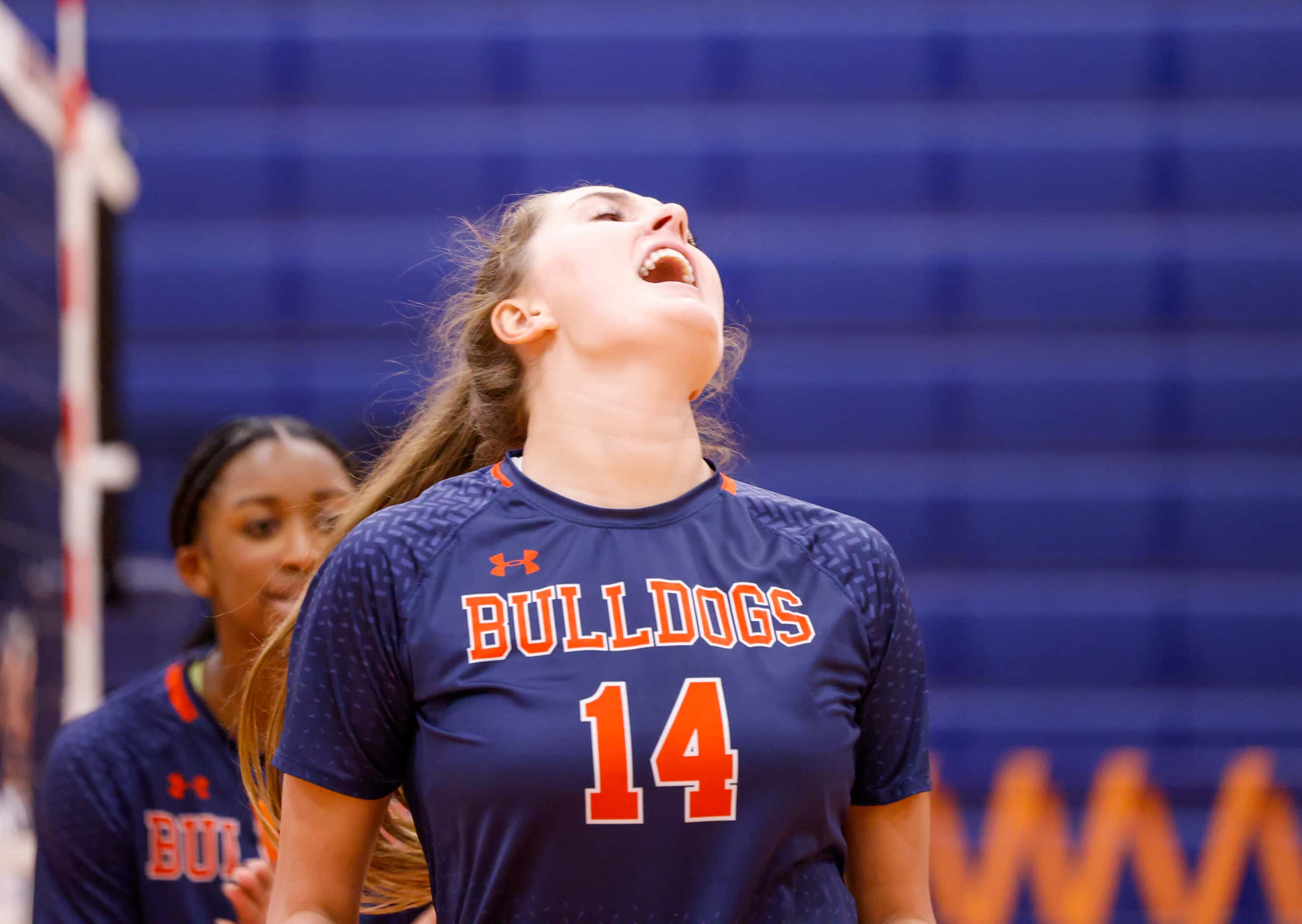 McKinney North Brooke Butler (14) yells in celebration of a point at a match against Lovejoy...