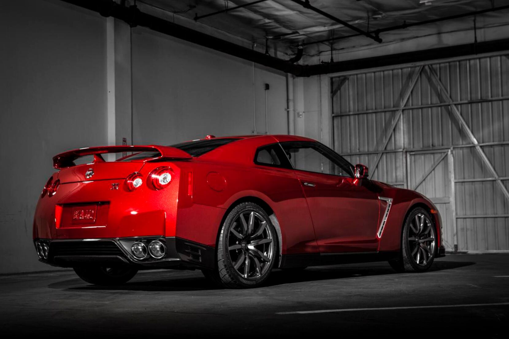 Parking Garage Nissan Gtr R Car That Has A Red Engine And Is