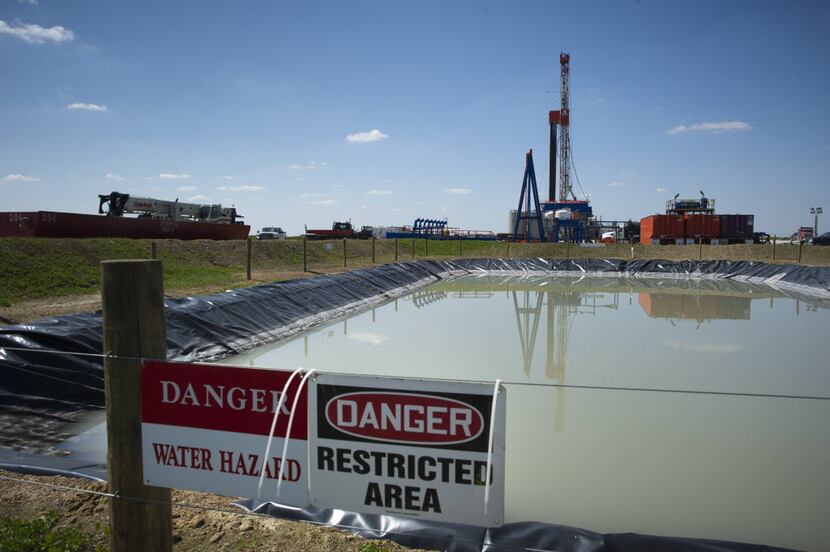  A drilling rig outside the town of Waynesburg, Pa. Drinking water there was contaminated by...