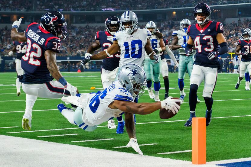 Dallas Cowboys running back Tony Pollard comes up just short as he dives for the end zone...