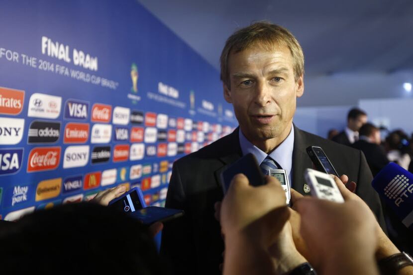 United States head coach Juergen Klinsmann from Germany answers journalists' question after...