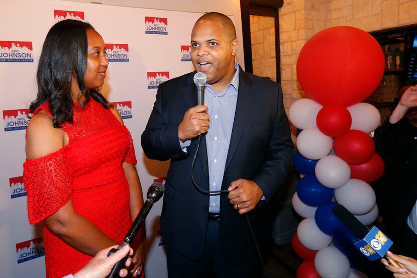 Dallas mayoral candidate Rep. Eric Johnson (right) delivers remarks on his early voting...