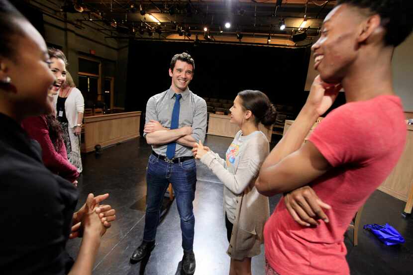 Plano-raised actor Michael Urie, speaks with students Alicia Crowder, 18, and Mykal...