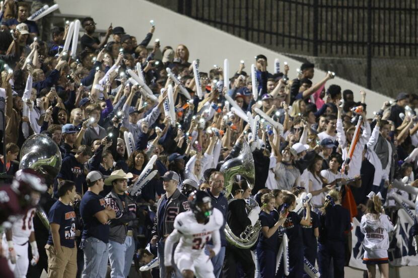 Sachse students were loud and proud from their section behind the team bench during a first...