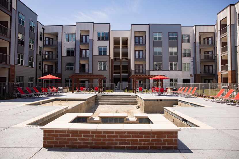 The almost-finished swimming pool area of the Palladium RedBird apartments.