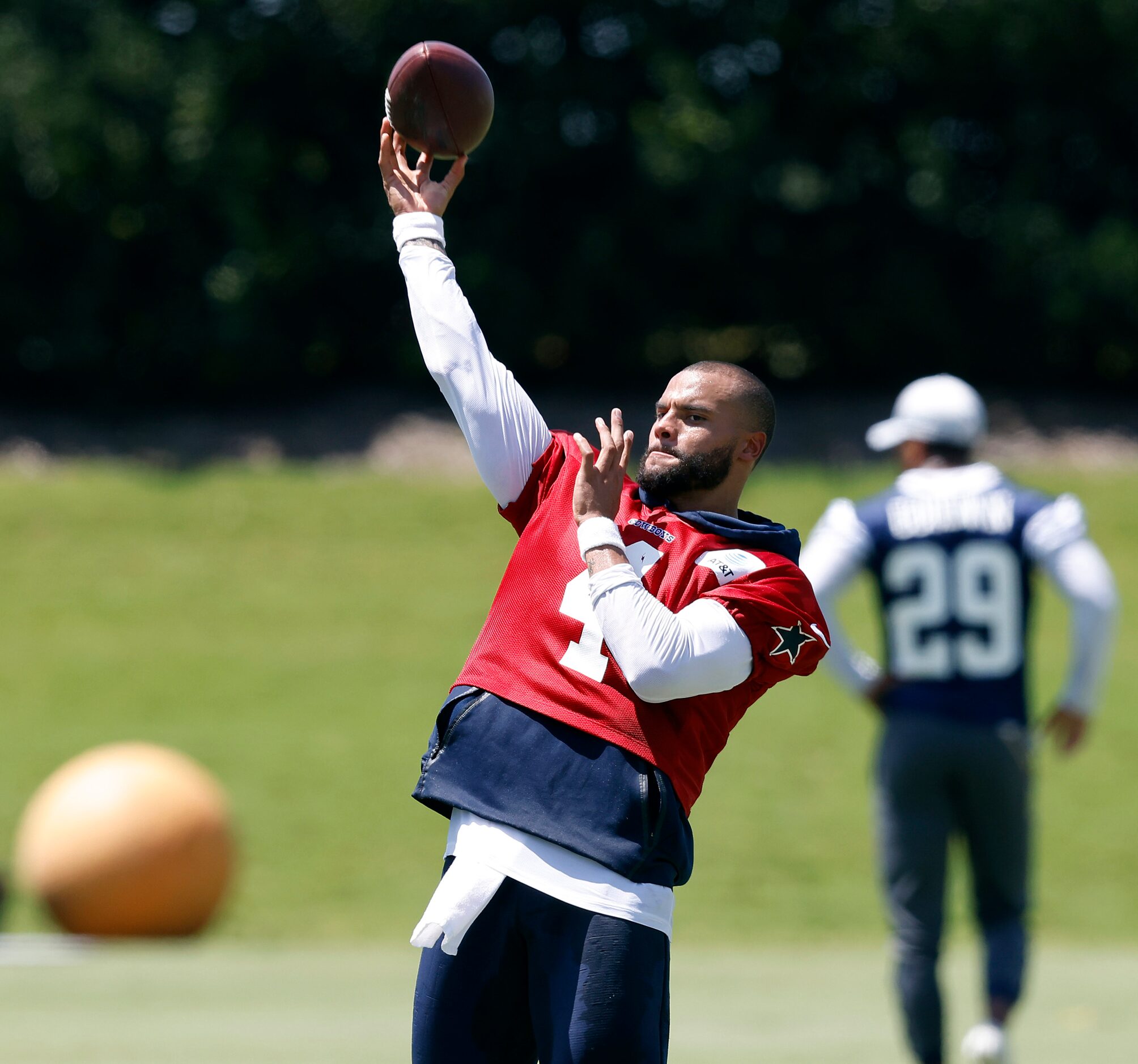 Dallas Cowboys quarterback Dak Prescott (4) throws deep passes following Training Camp...