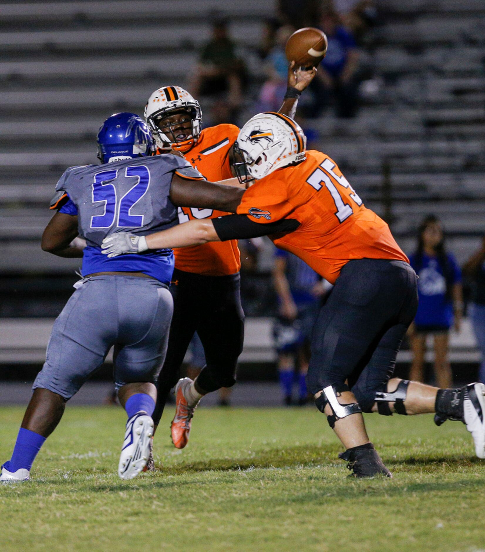 TXHSFB Haltom City senior quarterback Adam Hill (10) throws as North Mesquite senior...