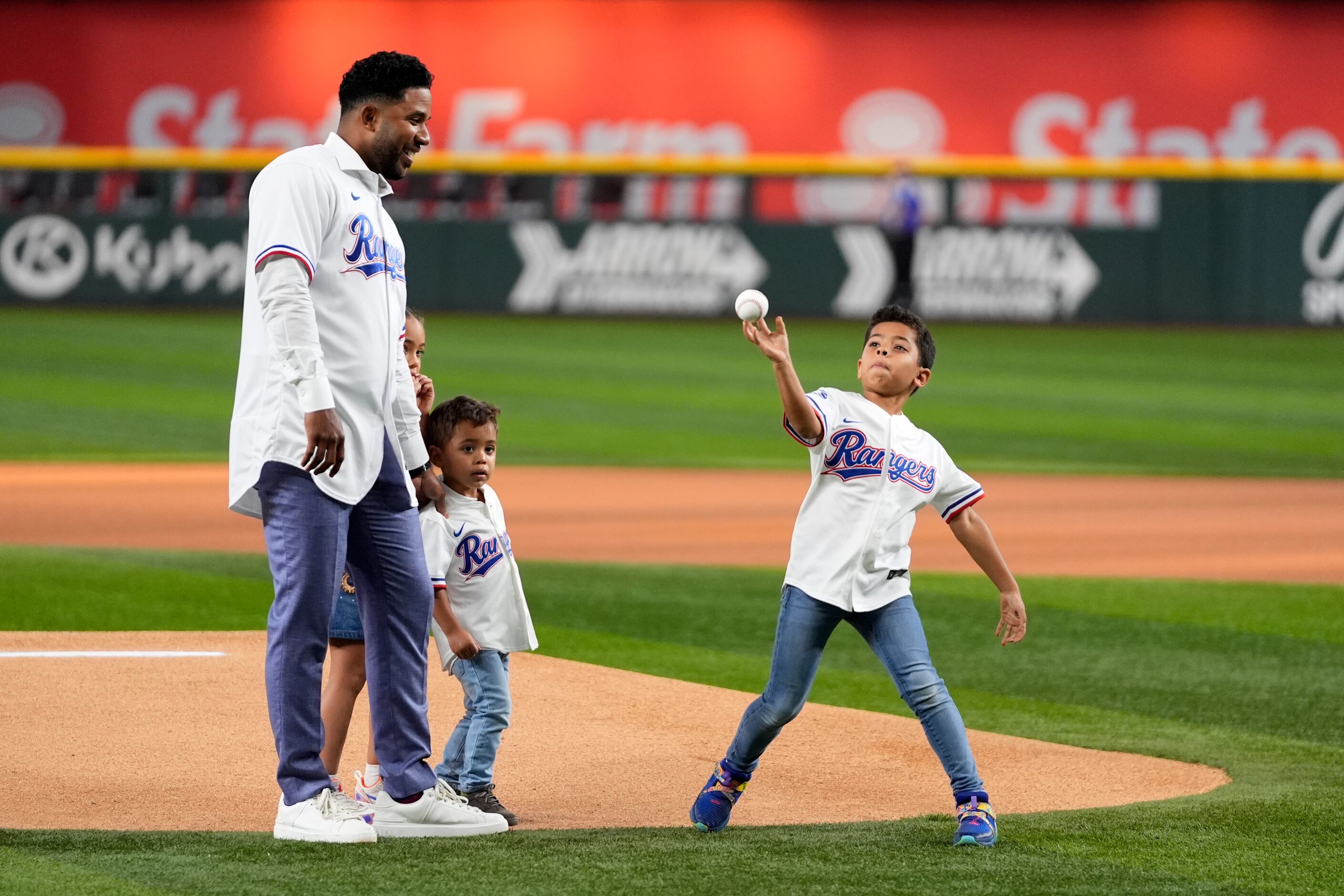 Texas Rangers former player Elvis Andrus, left, who announced his retirement earlier Friday,...