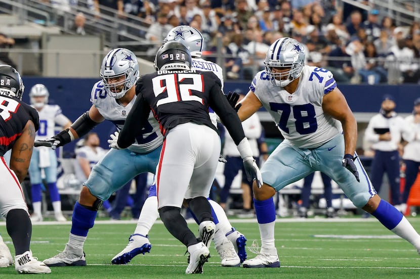 Dallas Cowboys guard Connor Williams (52) and offensive tackle Terence Steele (78) drop back...