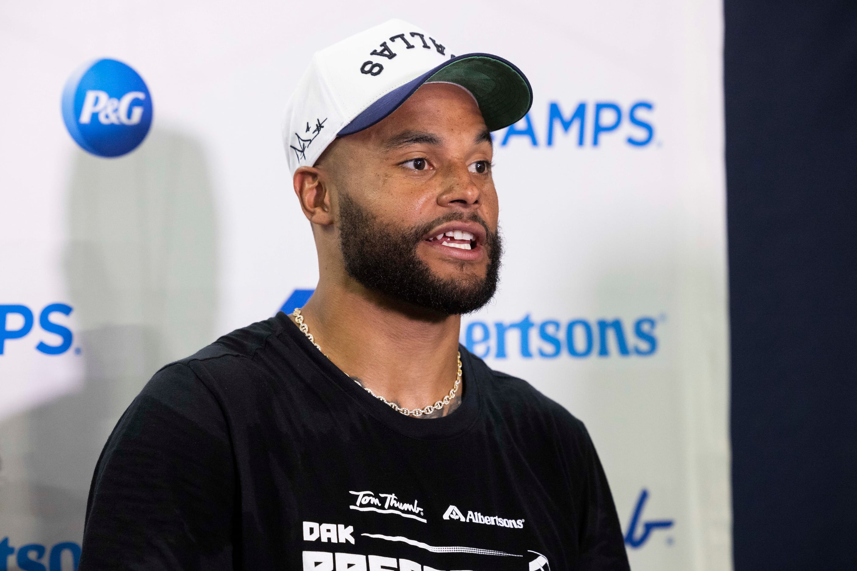 Photos: Cowboys' Dak Prescott run drills with students at his