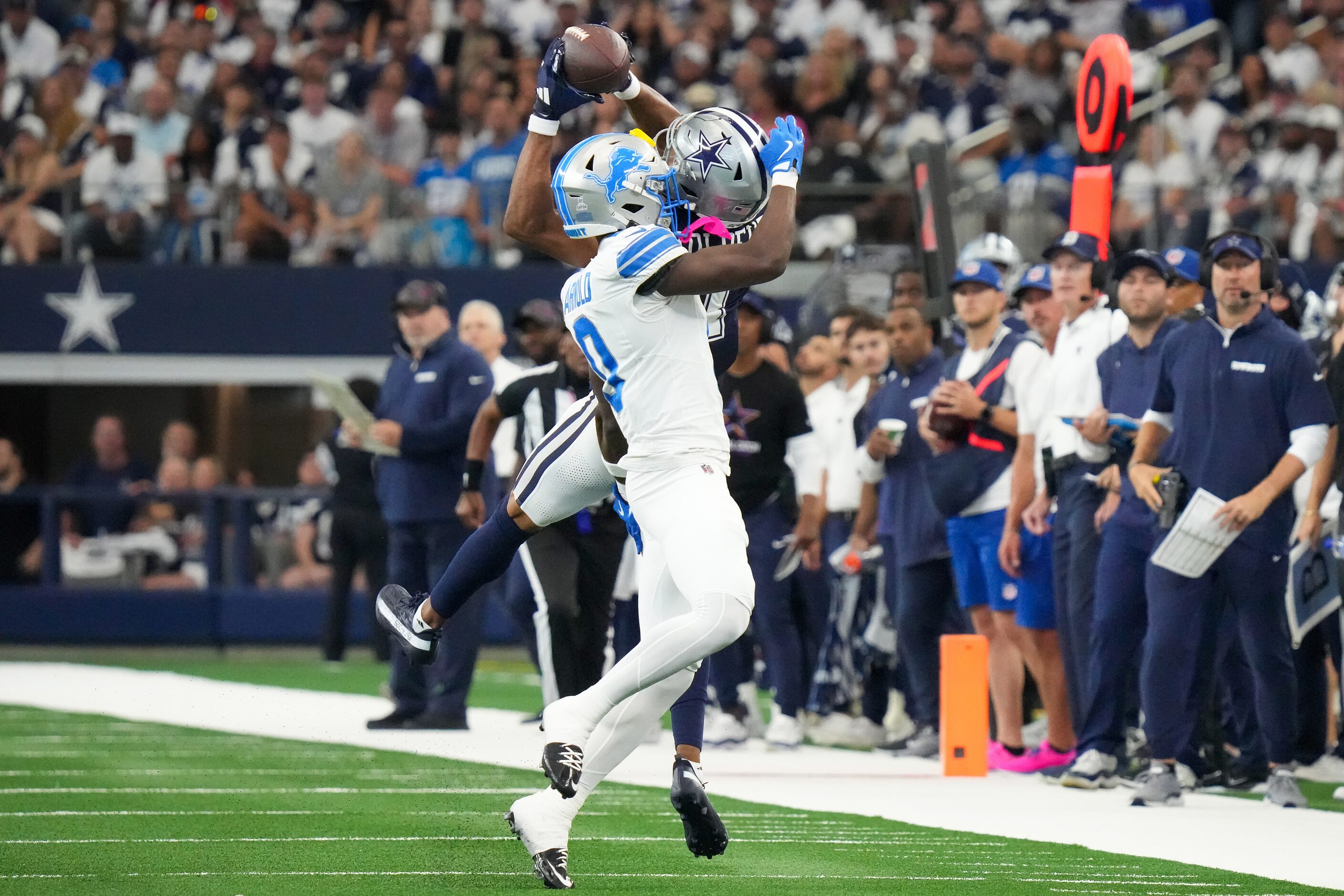 Dallas Cowboys wide receiver Jalen Tolbert (1) makes a catch as Detroit Lions cornerback...