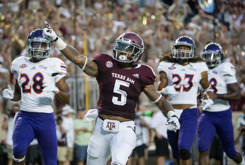 FILE - Texas A&M Aggies running back Trayveon Williams (5) celebrates a touchdown during a...