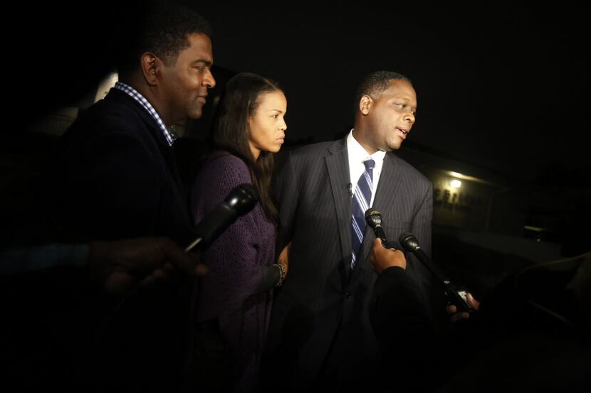Democrat Craig Watkins (far right) was joined by his wife, Tanya, and then-First Assistant...