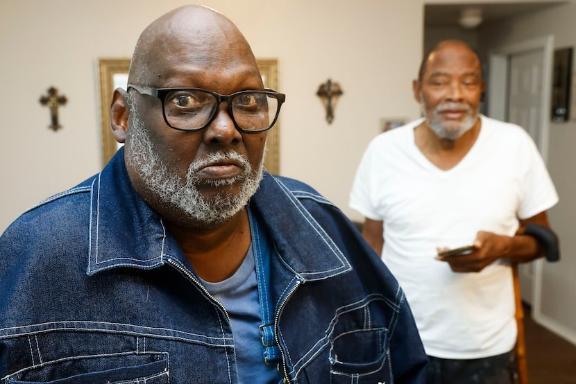 The Positano apartment resident John Clark (left), and his roommate Buddy Jefferson, pose...