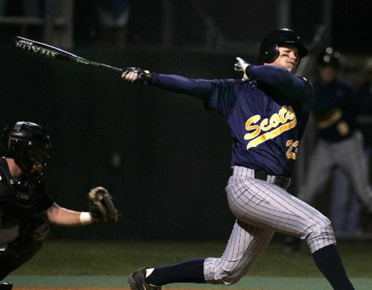 ORG XMIT: *S18D0E2CD* Highland Park High's first baseman Clayton Kershaw (23) takes a big...