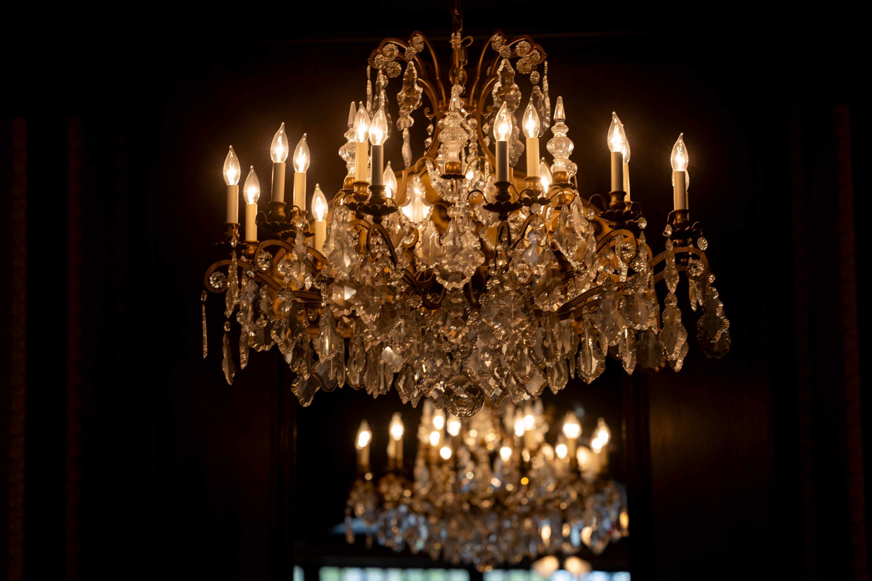 A chandelier hangs over the dining room at St. Martin's Wine Bistro on Bryan Street in Dallas.