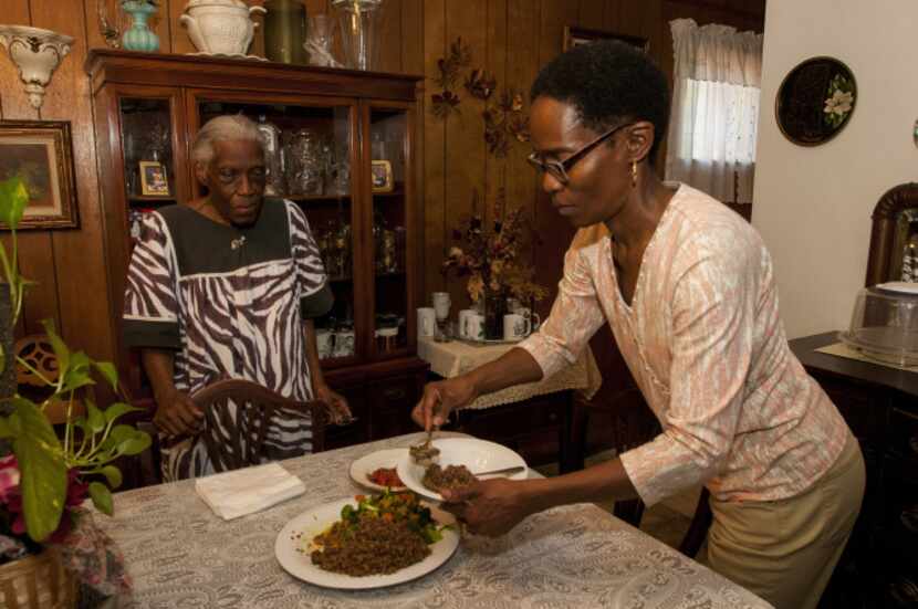 Re Richardson, a member of Black Vegetarian Society of Texas, prepared a vegan meal of...