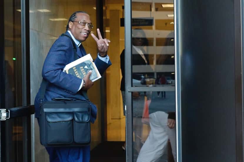 Dallas County Commissioner John Wiley Price walks into the Earle Cabell Federal Building and...