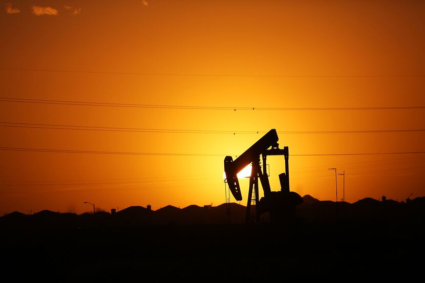 MIDLAND, TX - JANUARY 20: A pumpjack   sits on the outskirts of town at dawn in the Permian...