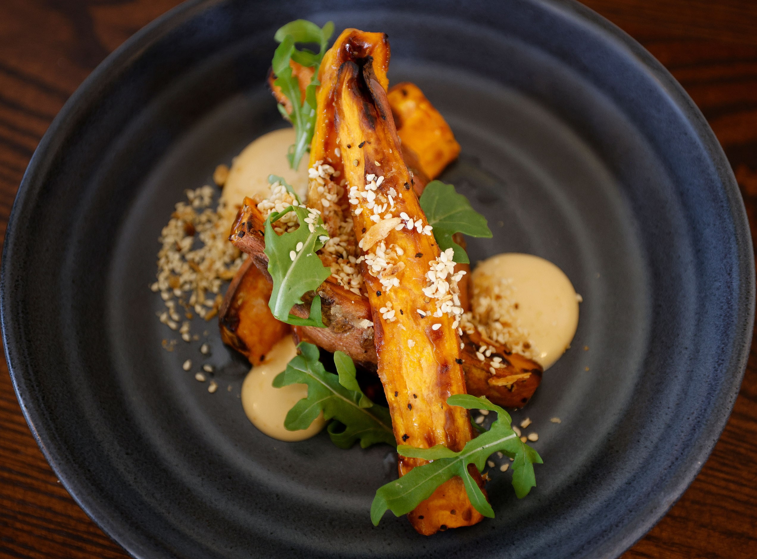 Grilled Sweet Potatoes are on the menu at Second Bar + Kitchen at The Crazy Water Hotel in...